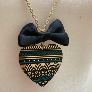 Gold heart shaped pendant necklace